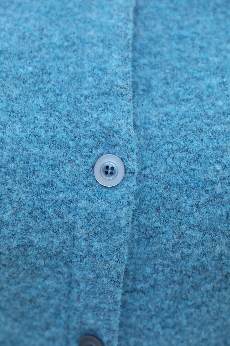 vêtement artist la marque cardigan-uni-a-fleur-de-peau