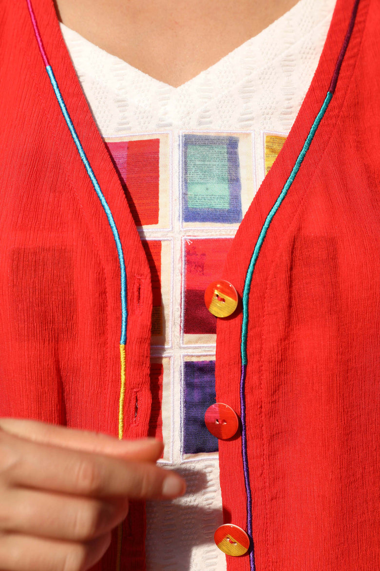 vêtement artist la marque cardigan-uni-brode-mille-une-couleurs